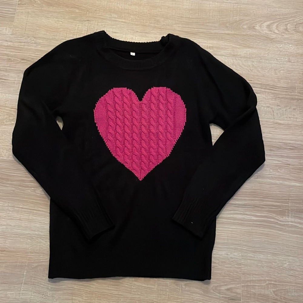 Black sweater with pink heart. Ladies small